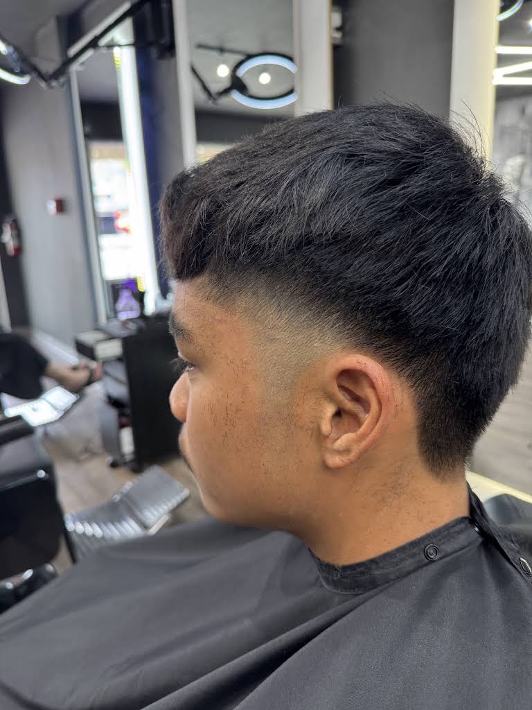 A clean fade photographed at Canvas